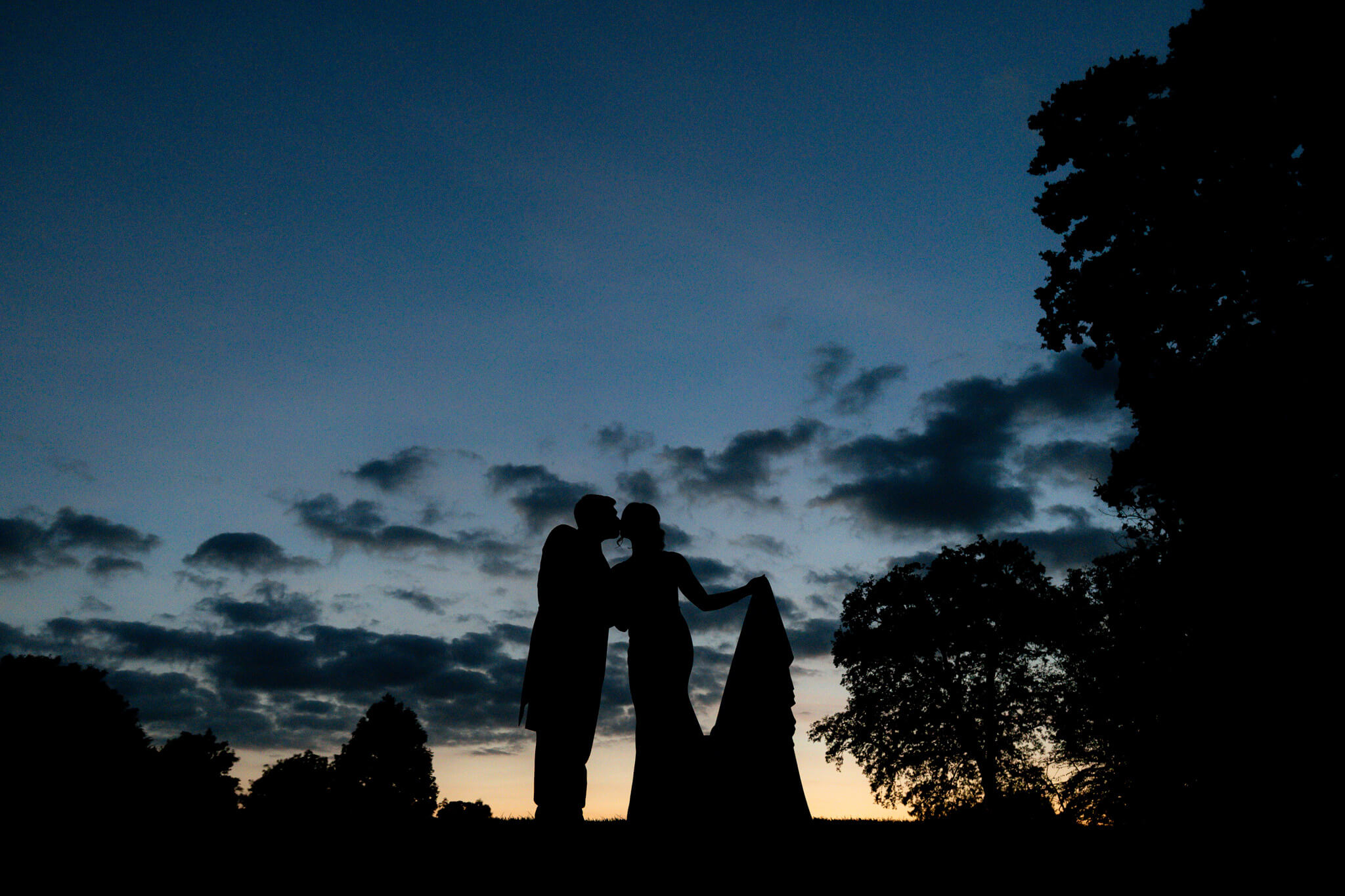Dusk wedding bride and groom silhouette at Stanbrook Abbey Malvern