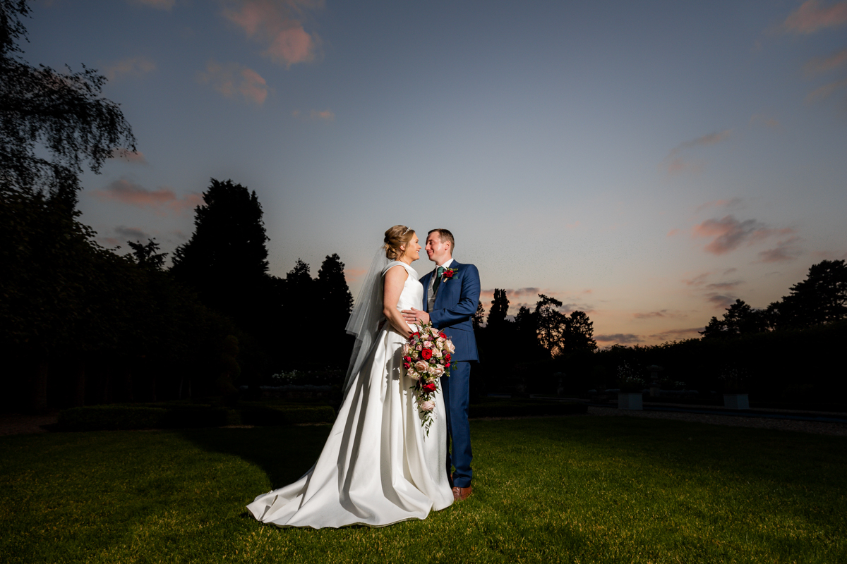 couple in arboretum at dusk photographed by Arley House and Gardens Wedding Photographer