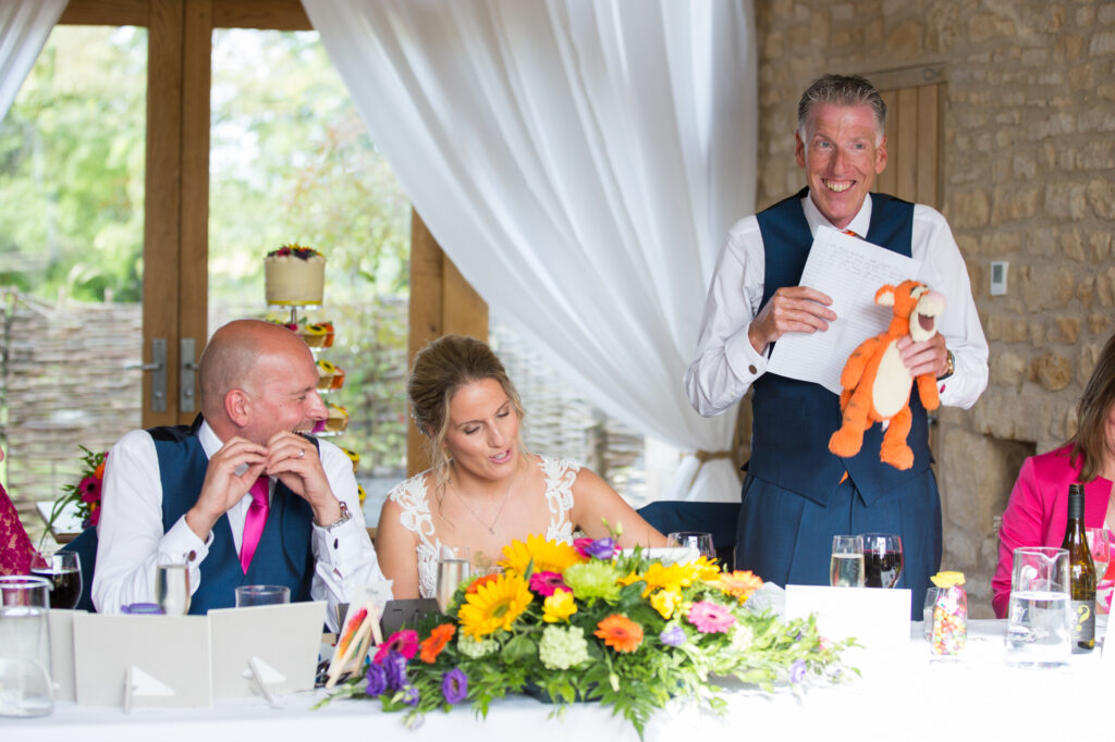 father of the bride giving his speech on a wedding day at the barn at upcote