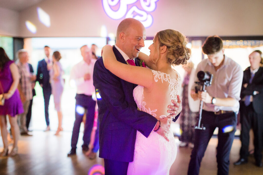 bride and groom during first dance at the barn at upcote wedding venue