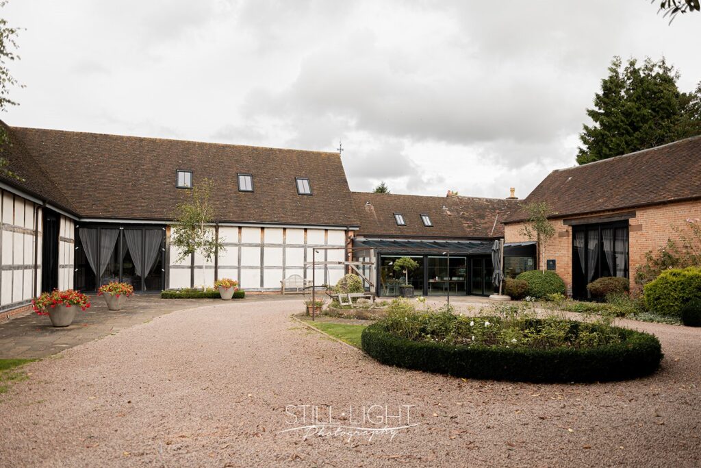 redhouse barn in stoke prior on a cloudy autumn wedding day
