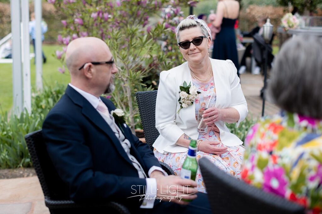 wedding guests enjoying drinks reception at redhouse barn