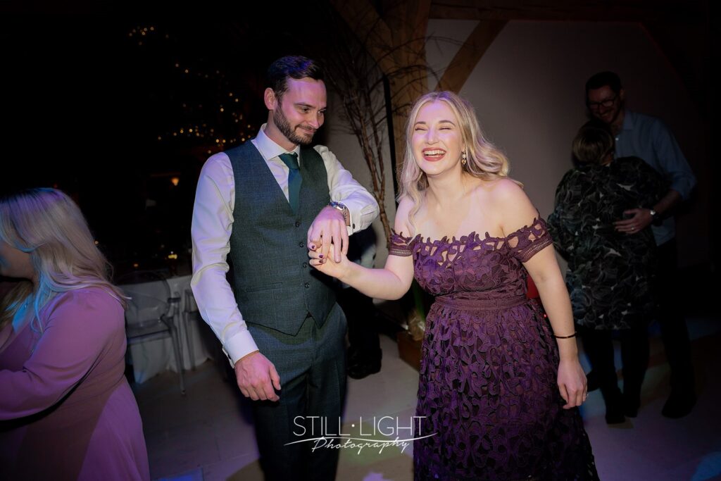 wedding guests dancing and having fun at redhouse barn wedding evening