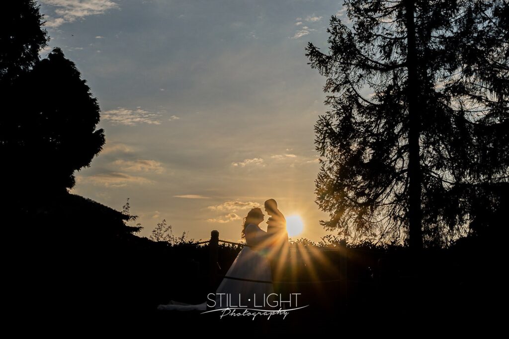 april sunset at redhouse barn with bride and groom