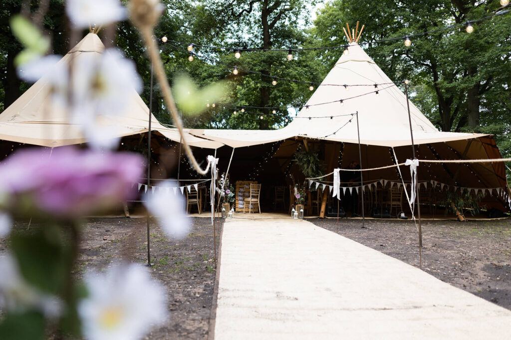 tipi marquee in woodland setting on wedding day